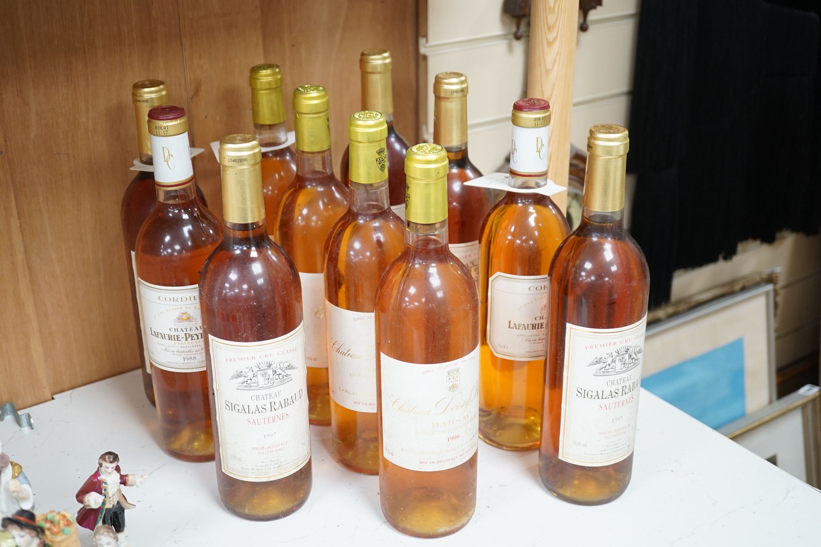 Three bottles of Chateau Lafaurie-Peyraguey 1988 Sauternes, five bottles of Chateau Doisy Daene 1996 and six bottles of Chateau Sigalas Rabaul 1997